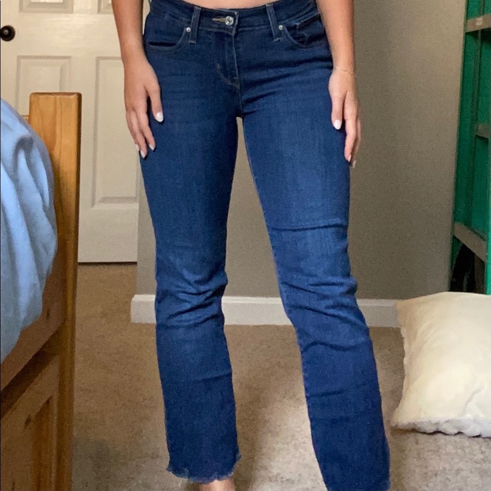 Dark Wash Levi’s slight flair jeans